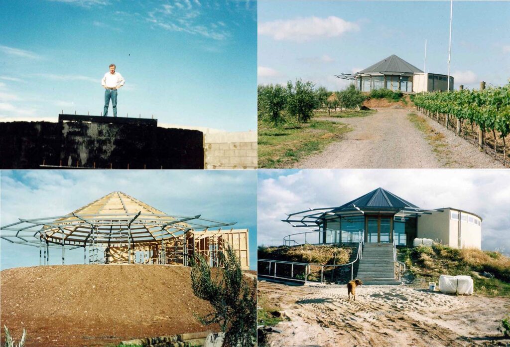 A collage of four photos, top left showing a man standing on top of a building, posing with his hands on his hips. The top right shows a gravel path leading to a  building, vineyards lining either side.
The bottom left shows the construction of the aforementioned building - the wooden structures standing before a dirt landscape. The bottom right image shows the completion of the building, with green bushes and sand leading up the the entrance. 